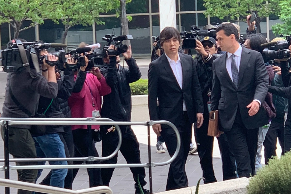 mizuhara lawyer walk into court